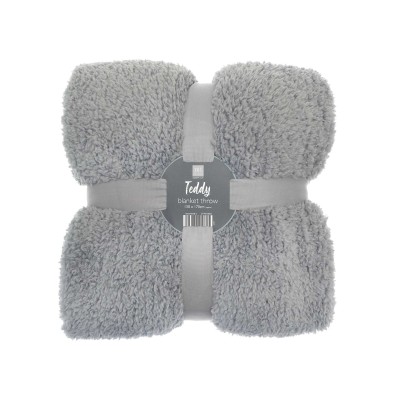 Coperta in tessuto a forma di orsetto con nastro Coperta in tessuto a forma di orsetto con nastro